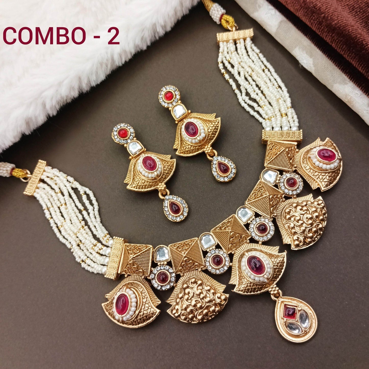 Rajwadi ethnic necklace for women with matching earrings featuring gold-tone and red stone details