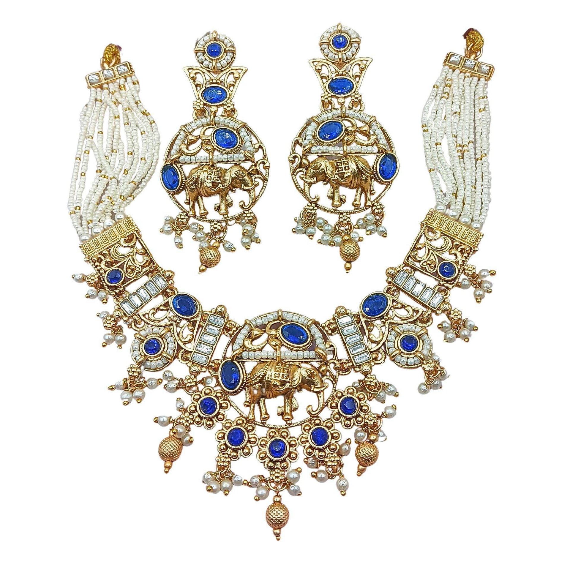 Rajputi elephant design necklace set with blue stones and pearl bead details in gold tone