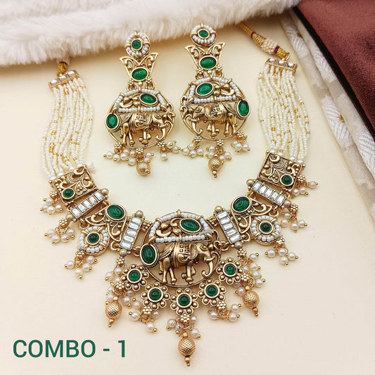 Rajputi elephant design necklace set with green stones and pearl details in gold finish