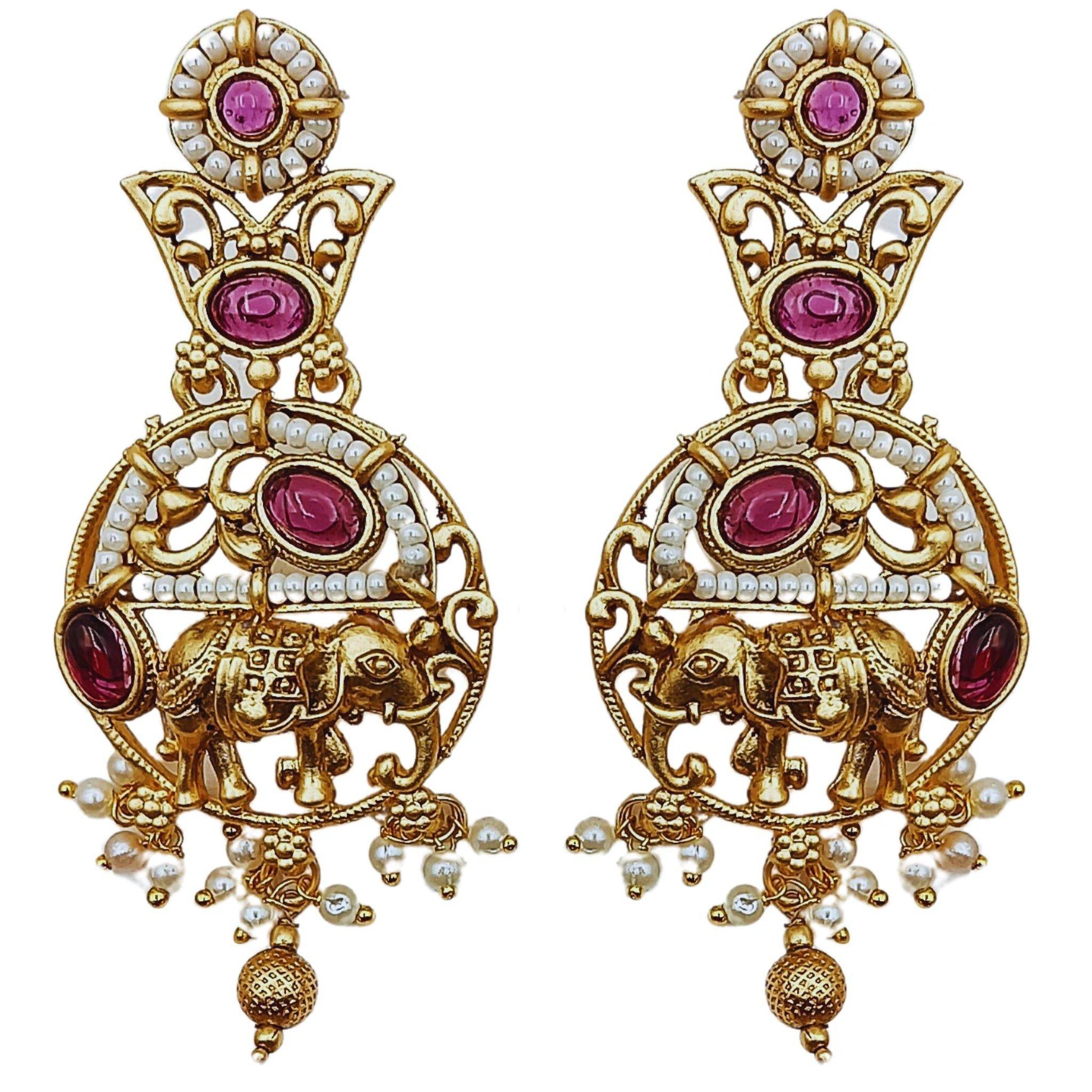 Gold and ruby Rajputi elephant design necklace set earrings with intricate detailing and pearl accents