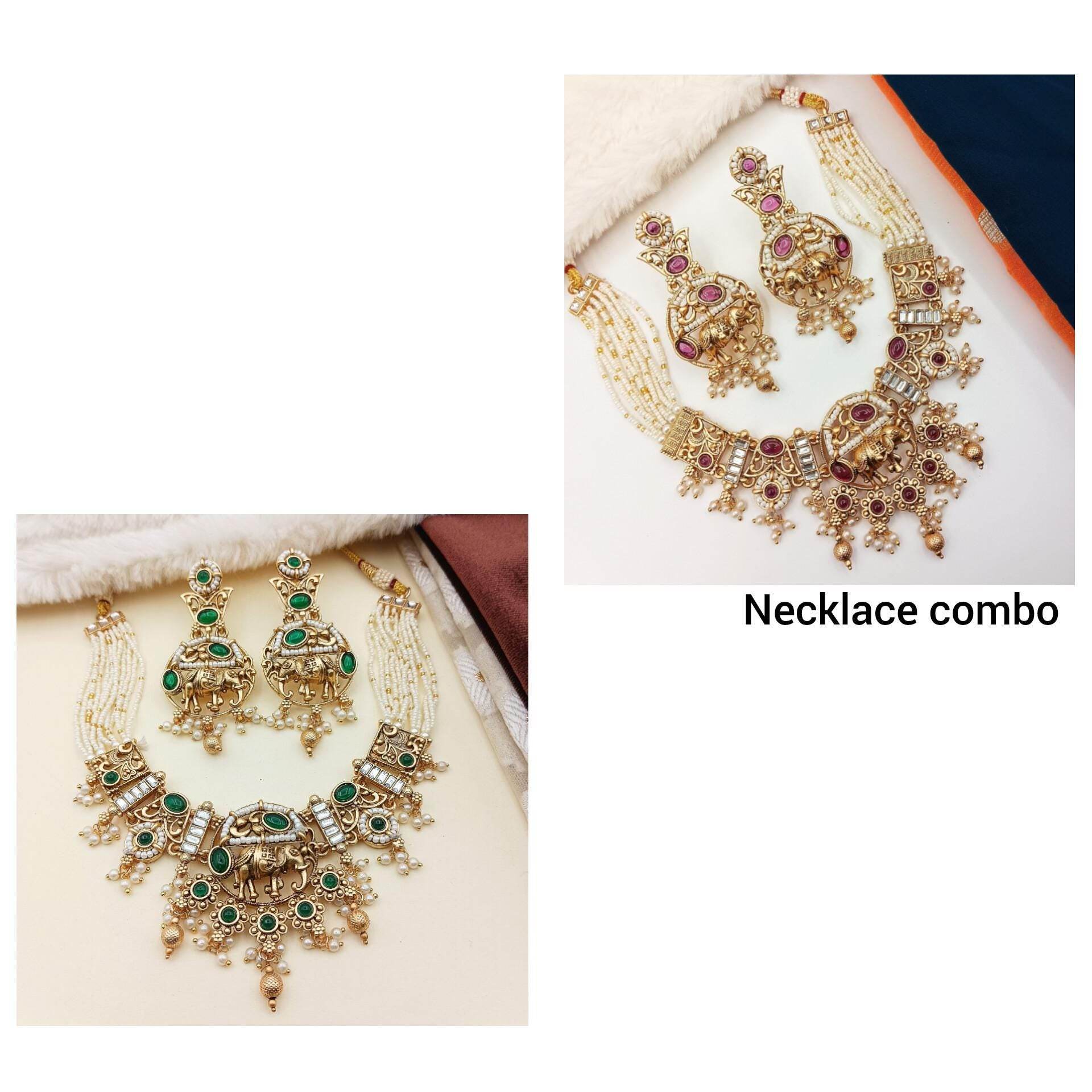 Rajputi elephant design necklace set with intricate gold detailing and colored gemstones in green and pink