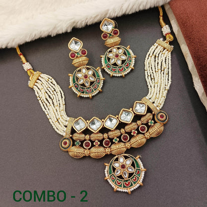Rajwadi jewelry set for women featuring intricate gold-tone necklace and matching earrings with green and red accents